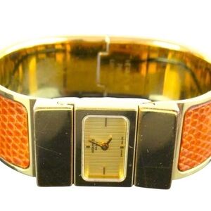 Hermes Gold Tone Bangle Watch with Brown Orange Lizard Leather band